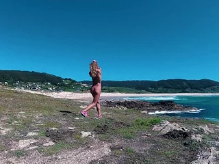 Russian Bird Sasha Bikeyeva - Spain Galicia beach Doninos. Perfect setting up naked nudist Bird teasing and winking above the coast of the Atlantic Gobs