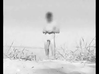 Huge output cock at a German nude beach